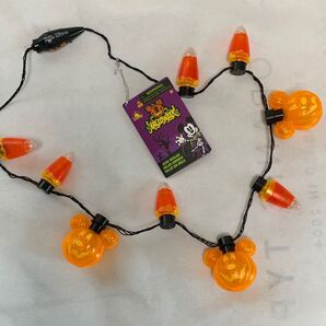 ディズニー ハロウィン 光るネックレス オレンジ 未使用 (点灯なし!)