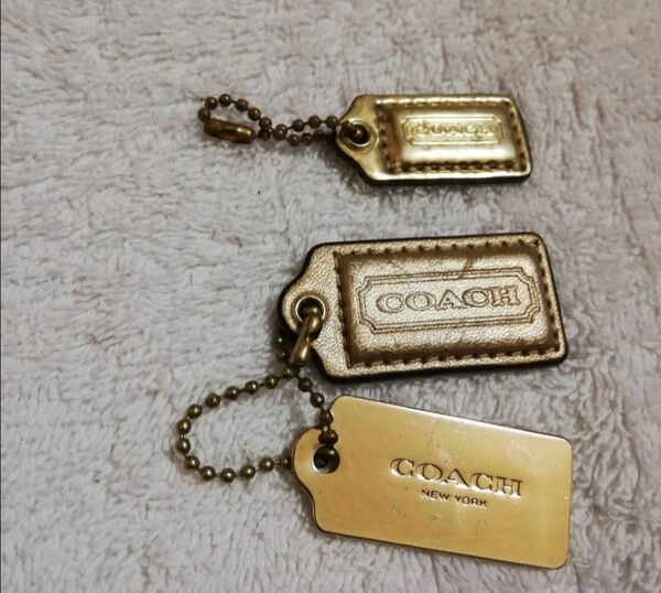 価格の相談には応じません タグ キーホルダー チャーム コーチ COACH 金色 金属 プレート