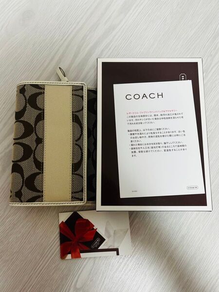 COACH 三つ折り財布 ベージュ系