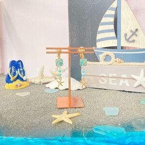 海につけたいイヤリング ターコイズブルー ヒトデ