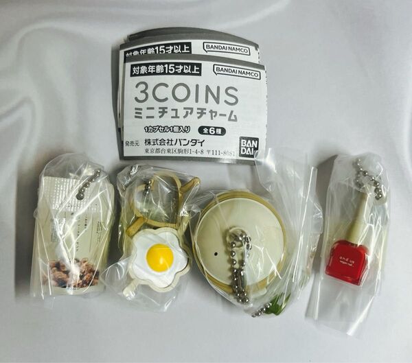 3COINS ミニチュアチャーム チョコレートアーモンドポップコーン ケアネイルポリッシュ ビストロヌードル シリコンリング 4種