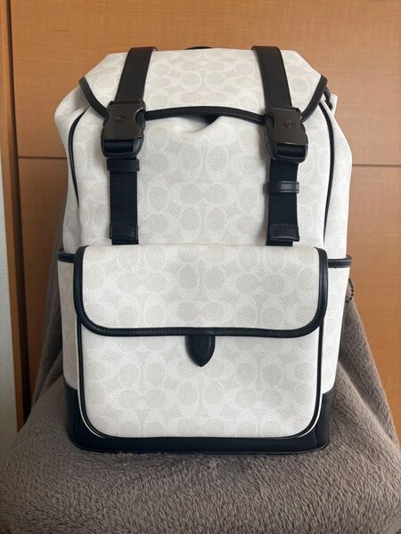COACH リーグ フラップ バックパック・シグネチャー キャンバス