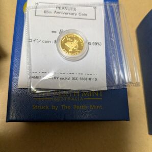 スヌーピー65周年記念金貨