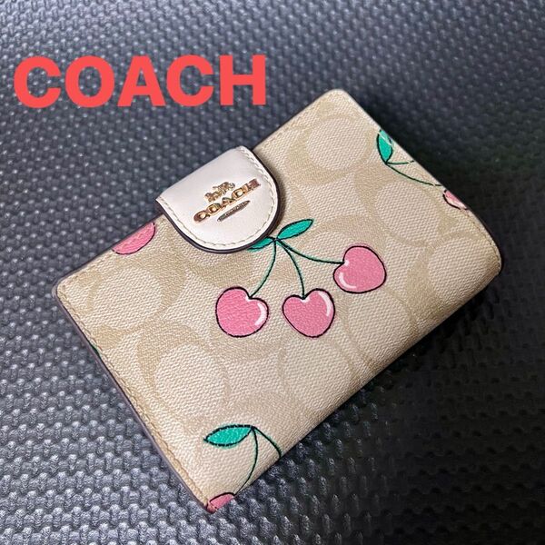 【美品】COACH さくらんぼ柄 二つ折り財布 ベージュ シグネチャー コンパクト ウォレット