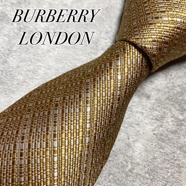 【美品】 BURBERRY LONDON バーバリーロンドン ネクタイ シルク ソリッド 無地調 ストライプ ゴールド系