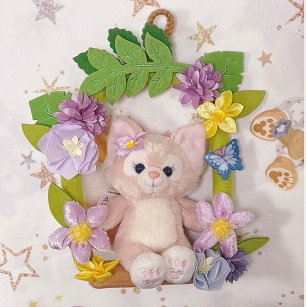 香港ディズニーランド リーナベル お花のブランコに座ったデザインの壁掛けぬいぐるみ