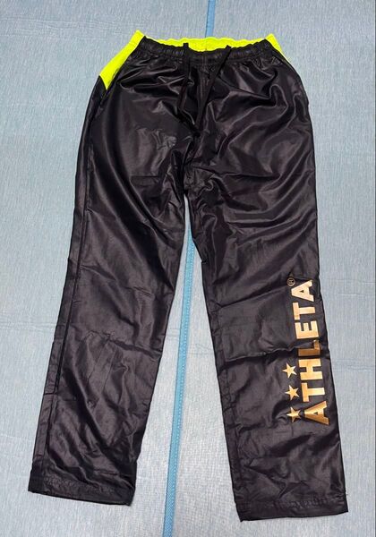 ATHLETA 150cm 黒/黄 シャカシャカ サッカー ピステパンツ フットサル トレーニング 運動 スポーツ