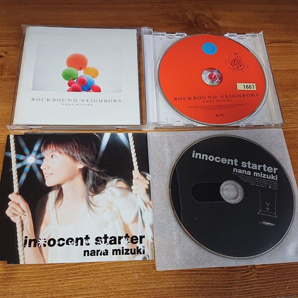 水樹奈々 2枚 セット まとめて innocent starter ROCKBOUND NEIGHBORS CD