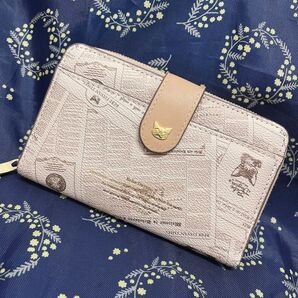 べべダヤン ニュースレター柄 二つ折り財布 わちふぃーるど