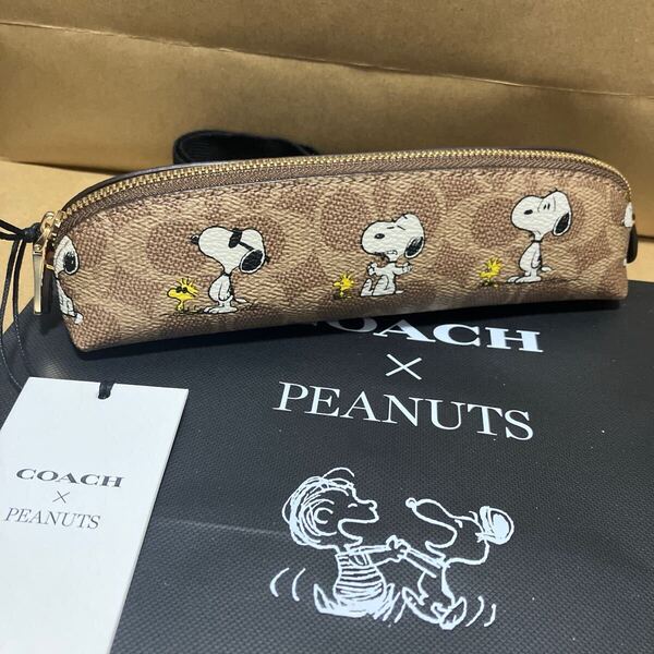送料込専用袋付●新品●完売品 COACH X PEANUTS スヌーピー ペンケース A ブラウンシグネチャー 1.3×0.9cm 2025新作 ピーナッツ コーチ