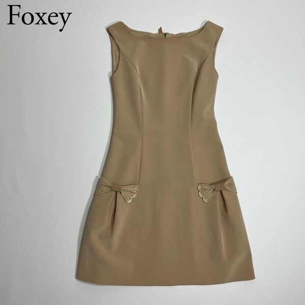 美品 FOXEY NEW YORK フォクシーニューヨーク ドレス ワンピース マドモアゼルボンボン ノースリーブ リボン 38 ベージュ系 レディース