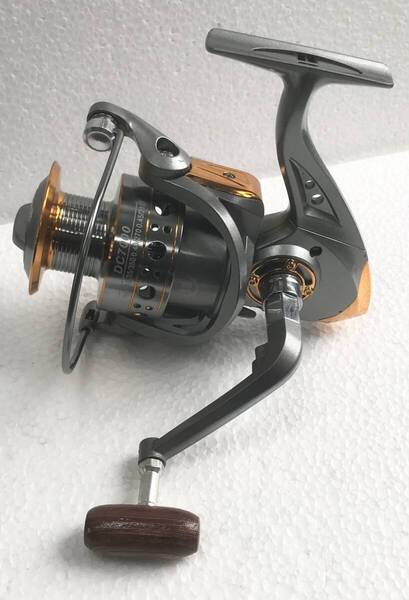 スピニングリールDC7000☆送料無料☆新品未使用☆ガンメタゴールド☆左右ハンドル変更可能☆400グラム☆アルミ合金製☆ベアリング13☆