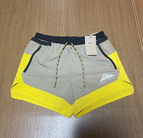 送料込み Mサイズ 新品 NIKE TRAIL ナイキトレイル ショートパンツ ショーツ ハーフパンツ トレラン ランニング 登山 トレッキング 黄色