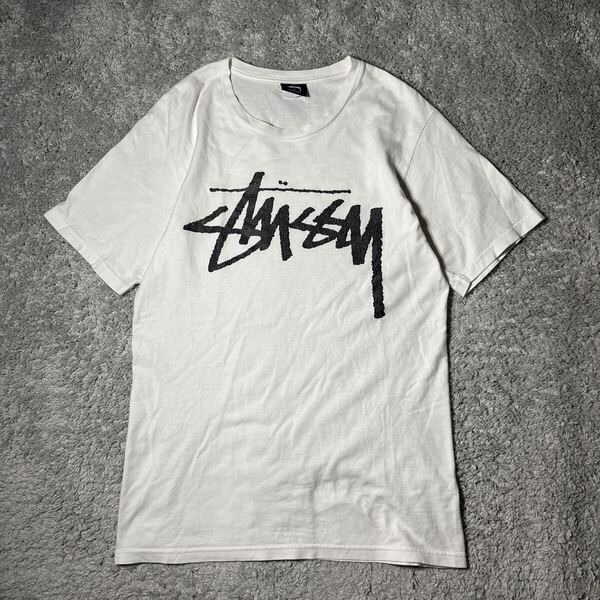 stussy ステューシー Tシャツ ホワイト 半袖 半袖Tシャツ センターロゴ ユニセックス プリントTシャツ 古着