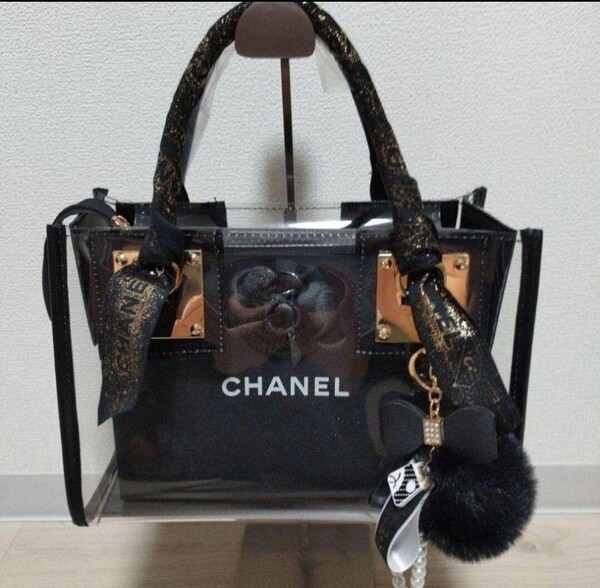 シャネル CHANELショップ袋リボンチャーム限定カメリア付き新品クリアバッグ