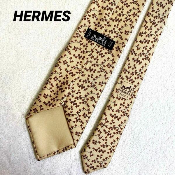 【美品】HERMES エルメス ネクタイ 葉っぱ柄 総柄 イエローベージュ ブラウン シルク100% 光沢 スーツ メンズ フォーマル