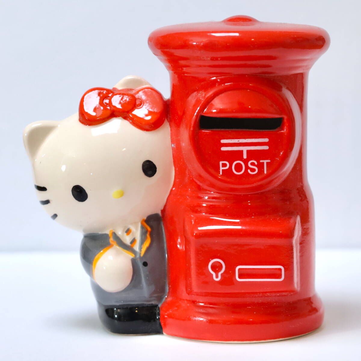 郵便局 OMCカードキティちゃん 配達員 貯金箱 陶器　レトロ Yahoo!オークション -「omcカード」の落札相場・落札価格