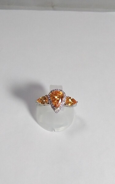 Pt900/K18YGスペサルティンガーネットダイヤリング!中石表面に傷有り。G1.12ct./0.73ct. D0.32ct.。宝石鑑別書付き。