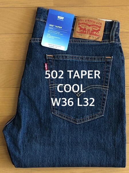 Levi's 502 TAPER COOL WORN INダークインディゴW36 L32