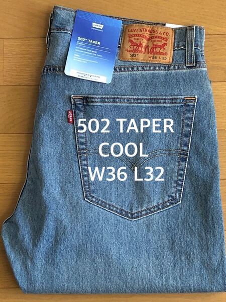 Levi's 502 TAPER COOL WORN INミディアムインディゴW36 L32