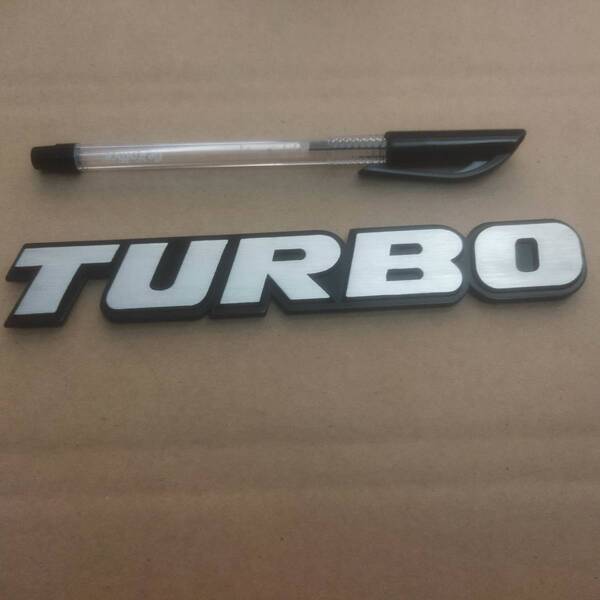 【ゆうパケット送料込】TURBO(ターボ) 3Dエンブレム(両面テープ) シルバー 横16cm×縦2.5cm×厚さ4mm ①