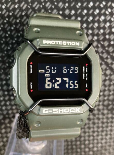 【ボタンをシルバーに変更しています】DW-5600VT◯AMERICAN RAG CIE◯アーミーグリーン系カラー◯ベゼルベルト交換用としても G-SHOCK