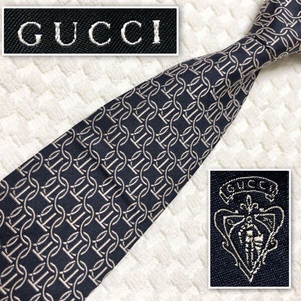 ■良品■GUCCI グッチ ネクタイ サークル 格子 金具 総柄 シルク100% イタリア製 ブラック×シャンパンゴールド ビジネス