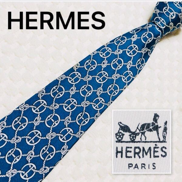 ■良品■HERMES エルメス ネクタイ ロープ 網目状 シェーヌダンクル風 総柄 シルク100% フランス製 670 OA ビジネス ブルー系