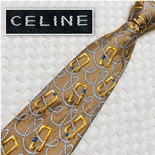 ■美品■CELINE セリーヌ ネクタイ 金具とロープ スカーフ柄 総柄 ベージュ×ゴールド等 シルク100% スペイン製 ビジネス