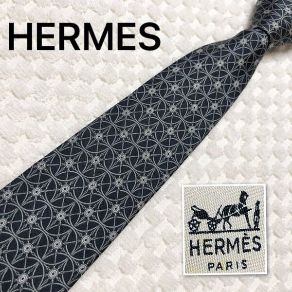 ■良品■HERMES エルメス ネクタイ サークル 金具 総柄 シルク100% フランス製 702 OA ブラック×グレー ビジネス