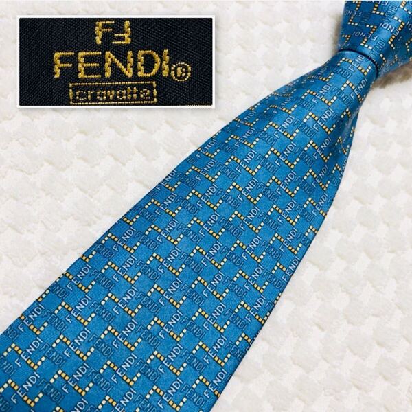 FENDI フェンディ ネクタイ ロゴ ジグザグストライプ 総柄 シルク100% イタリア製 ブルー系×イエロー系 ビジネス