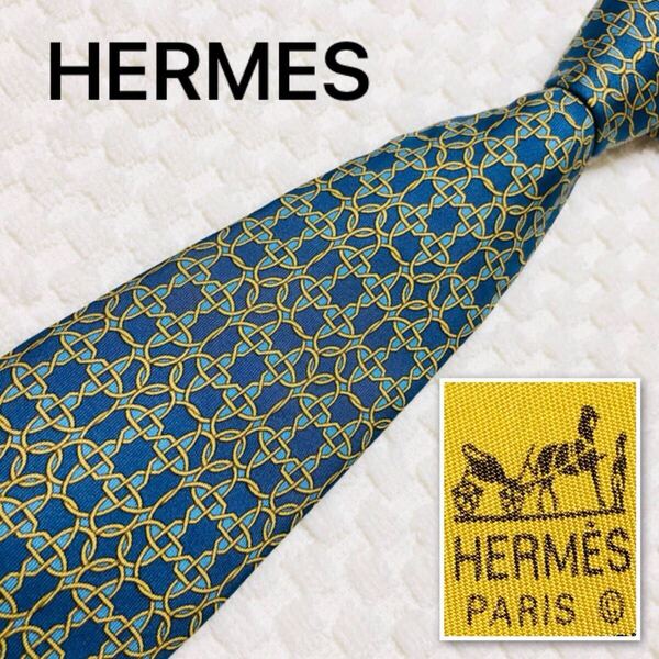 ■美品■HERMES エルメス ネクタイ 金具 総柄 シルク100% フランス製 7821 UA ブルー系×イエロー ビジネス