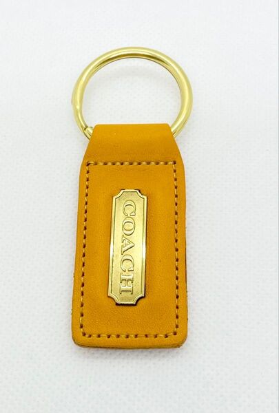 COACH キーホルダー レザー イエロー ブラウン 革 キーリング コーチ チャーム ゴールド金具