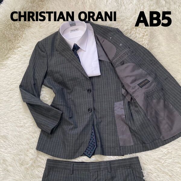 クリスチャンオラーニ 洋服の青山セットアップスーツ グレーAB5
