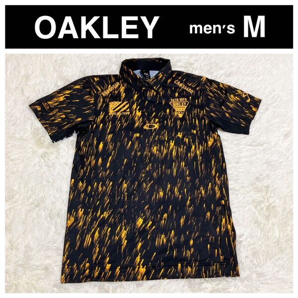 OAKLEY オークリー 半袖ポロシャツ ゴルフウェア 総柄 M メンズ 速乾 刺繍 ブラック 黒 オレンジ