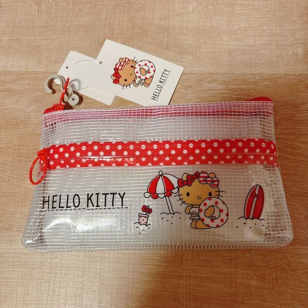 新品 サンリオ しまむら 日焼けキティ クリアフラットポーチ