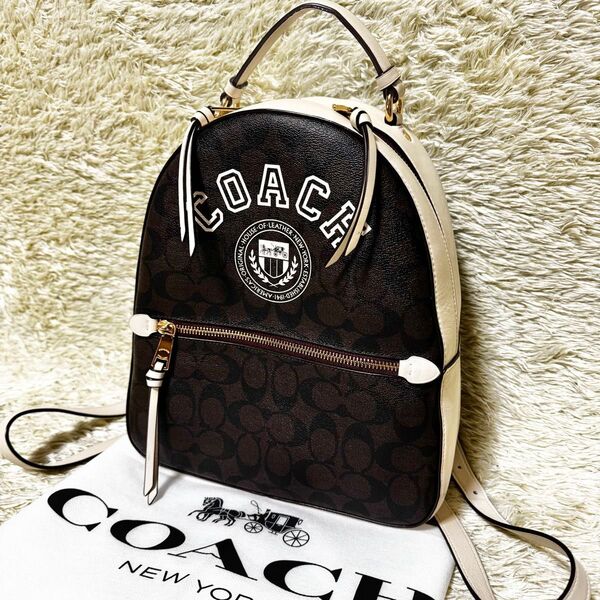 COACH コーチ リュック ジョーディン ヴァーシティ デカロゴ シグネチャー PVC レザー ブラウン ホワイト バックパック