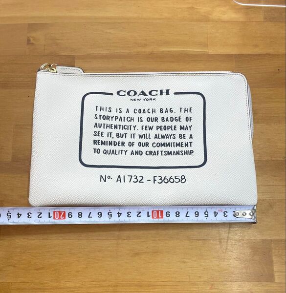 本物! COACH コーチ コスメ ポーチ ロゴ 大きめ レザー マルチケース 小物入れ アイボリー ホワイト クラッチバッグ