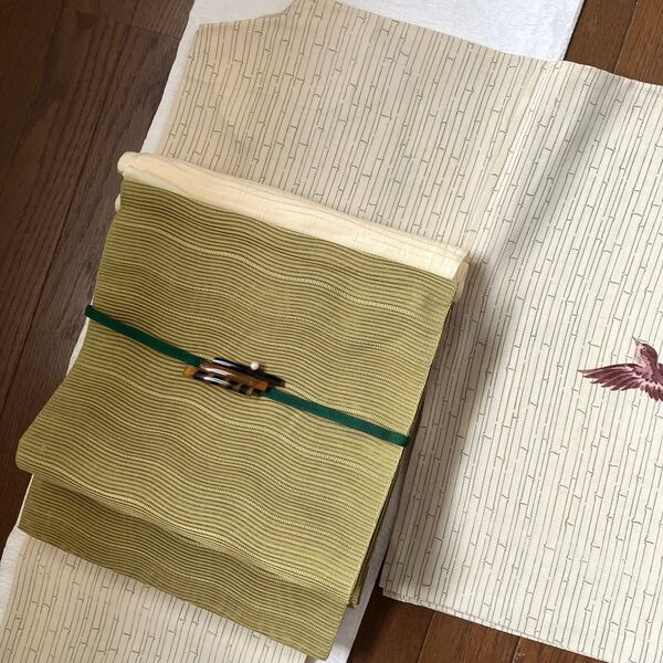 趣き深い大人の夏の八寸名古屋帯 市紅茶よろけ縞の正絹絽綴れ名古屋帯
