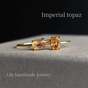 R027*18kgp インペリアルトパーズ オーバルファセットカット リング