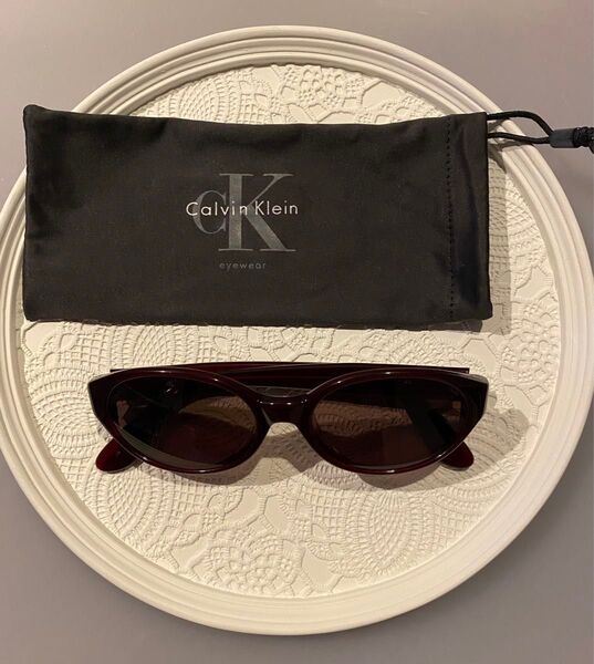 Calvin Klein アイウェア サングラス メガネ レッド系