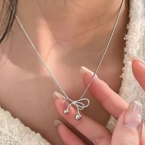 レディース ファッション アクセサリー リボンペンダント ネックレス おしゃれ 可愛いデザイン シルバー261428