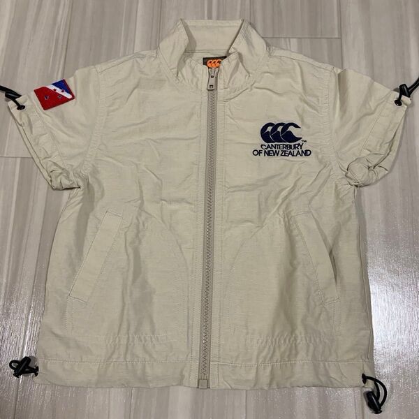 CANTERBURY キッズ 90cm カンタベリー ベージュ 男の子 ラグビー ナイロンジャケット 半袖 春 夏 スポーツ