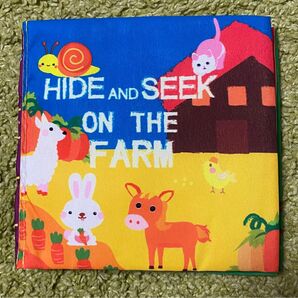 匿名配送 新品 農場の中のかくれんぼ布絵本 英語 しかけ絵本 おもちゃ 0歳 1歳