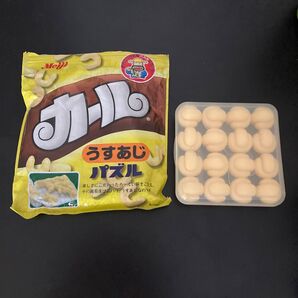 明治 カールうすあじパズル