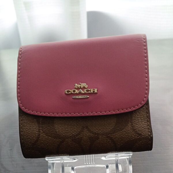COACH 二つ折り財布 ピンク×ブラウン シグネチャー