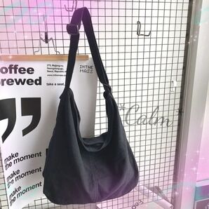ニュースペーパーバッグ ショルダーバック 斜めがけ 帆布 黒 ブラック 大容量 バッグ