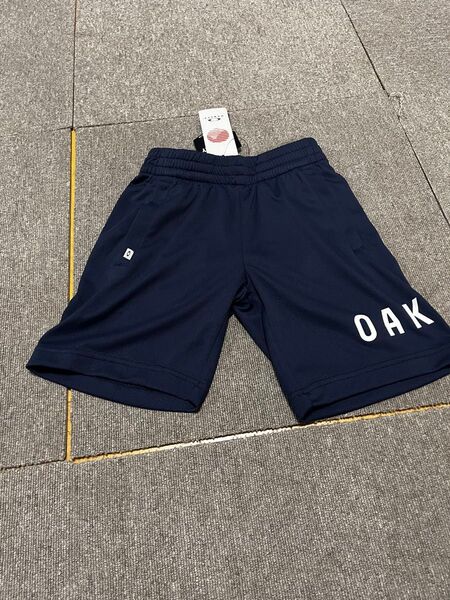 OAKLEY オークリー ジュニア キッズ ハーフパンツ ショートパンツ 短パン ハーパン ショーツ 半ズボン 紺 ネイビー