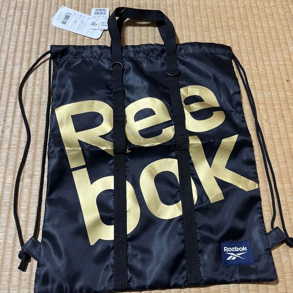 タグ付き Reebok リーボック ナップザック 2WAY 全面ロゴ入り Dカンが付き手提げ付き 巾着バッグ