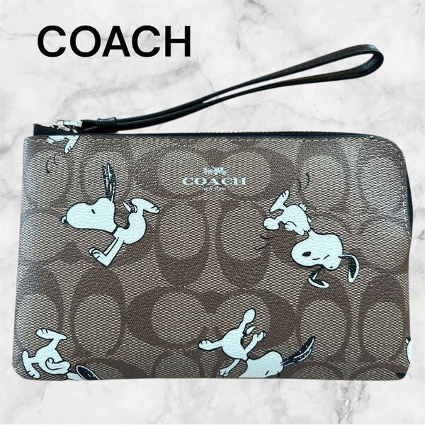 COACH X PEANUTS コーナー ジップ リストレット シグネチャー コーチ ポーチ